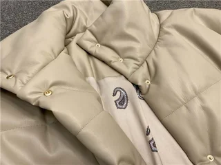 Женский короткий кожаный пуховик. Модель DM-31 - миниатюра 17