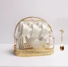 1 чайник + 6 чашек + 6 блюдец + метал. корзина + 6 ложек (обыч.)