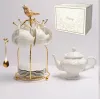 1 чайник + 6 чашек + 6 блюдец + 6 ложек + птичья клетка (подар.)